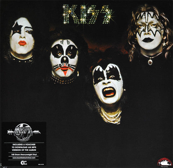 Kiss album cover with band members in makeup against a black background