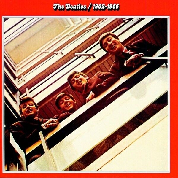 The Beatles album cover for the 'Red Album', featuring a photo of the band members looking down from a balcony