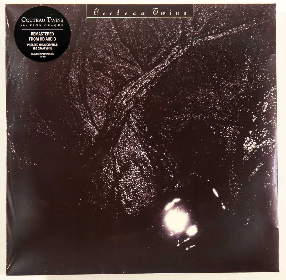 Cor art of Cocteau Twins The Pink Opaque Remastered Vinyl LP