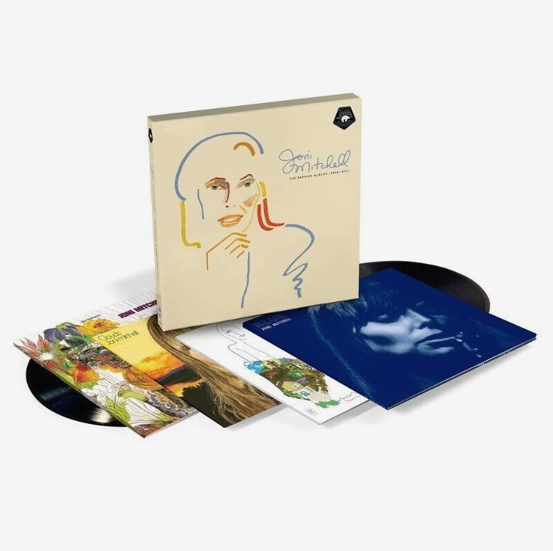 A vinyl box set of Joni Mitchell albums, containing four records with sleeves displayed in front of a box cover featuring a coloured sketch of Joni Mitchell.