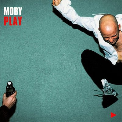 Moby Play 2x vinyl LP, 1999 electronic/ambient album with blue tones and minimalist design with Moby jumping in the air