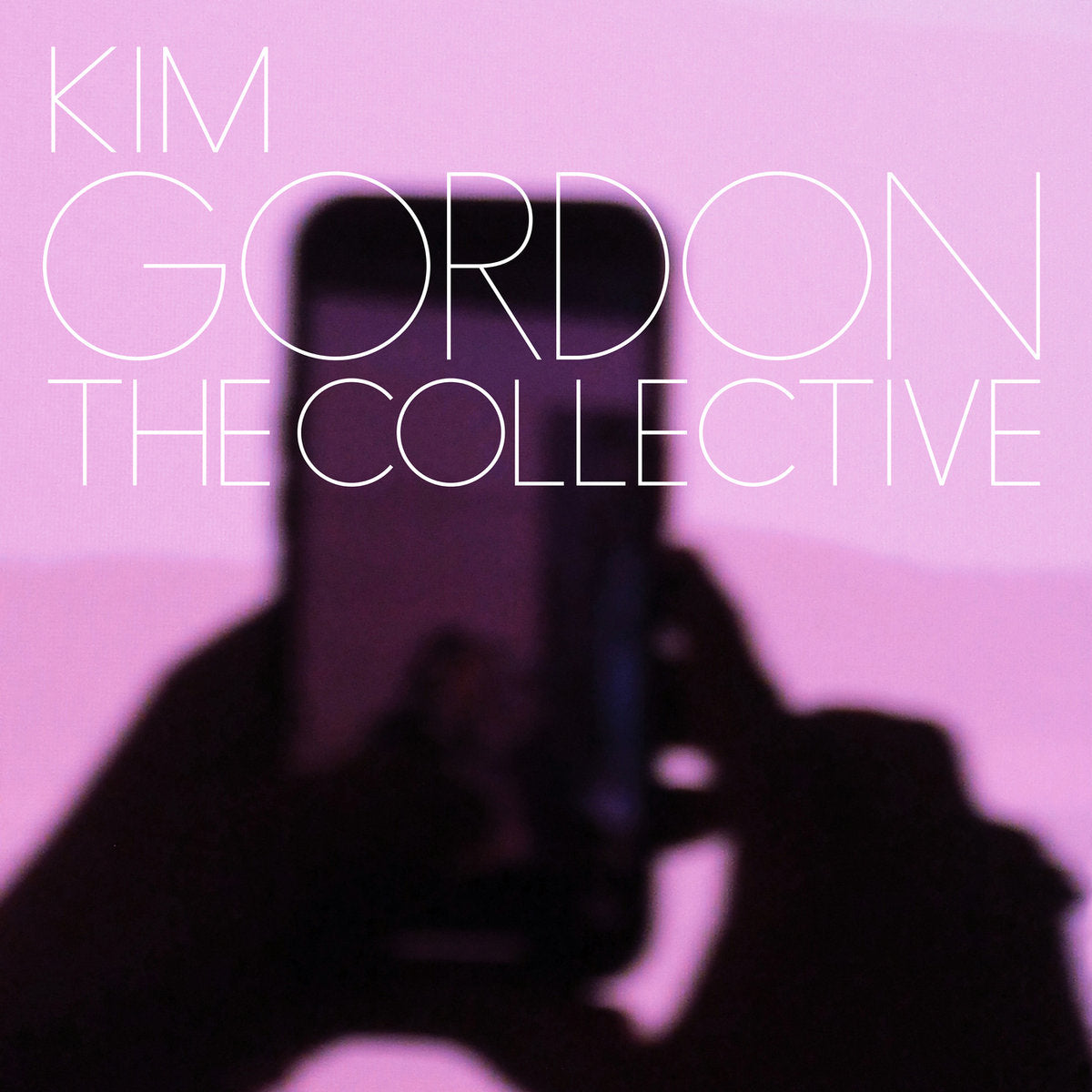 A vinyl LP cover of Kim Gordon - The Collective with a blurred image of a mobile phone