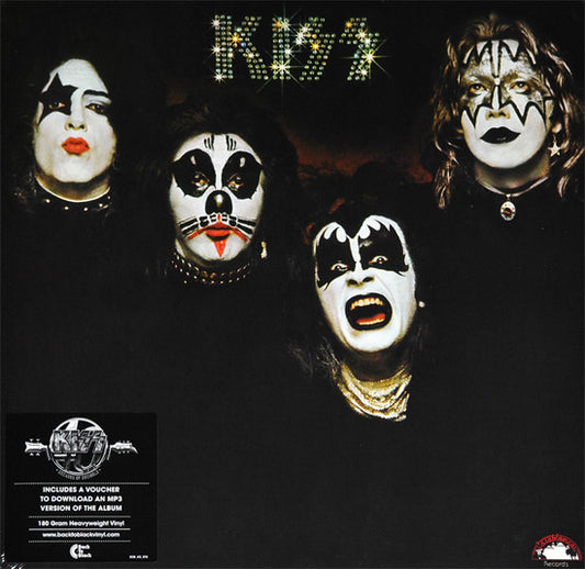 Kiss album cover with band members in makeup against a black background
