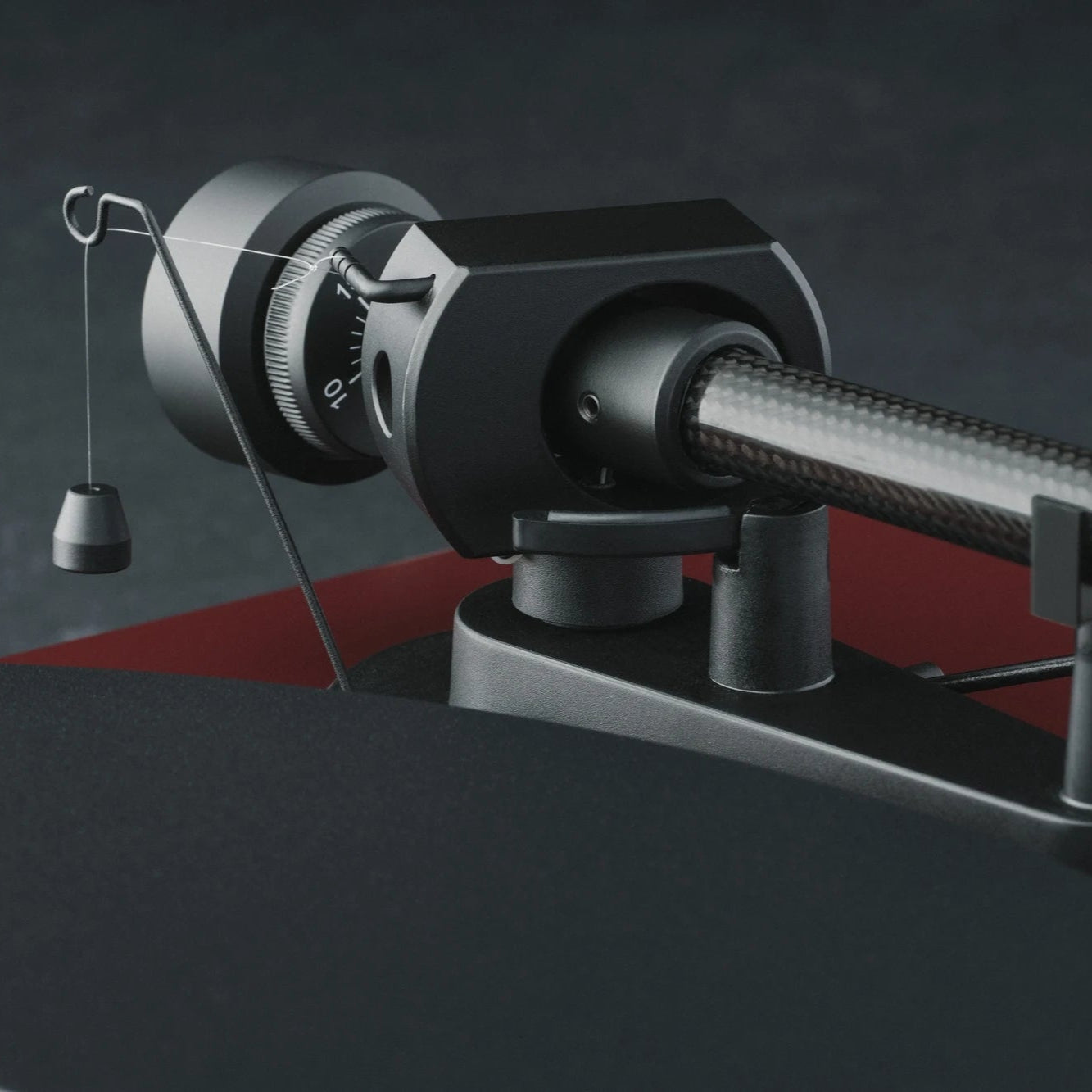 close up of turntable-weight on Pro-Ject Debut EVO 2 record player, precision-engineered, high-torque motor, sleek modern design