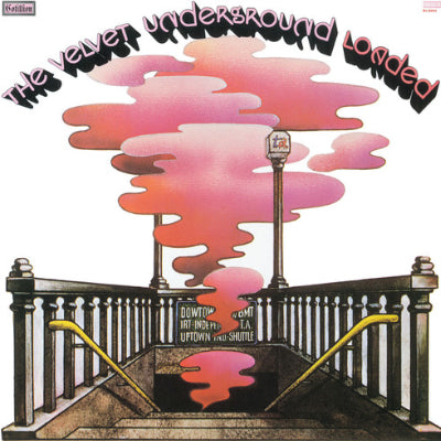 The Velvet Underground - Loaded album cover, featuring a purple and pink smoke rising from the underground with the band's name and the title 'THE VELVET UNDERGROUND LOADED' prominently displayed.