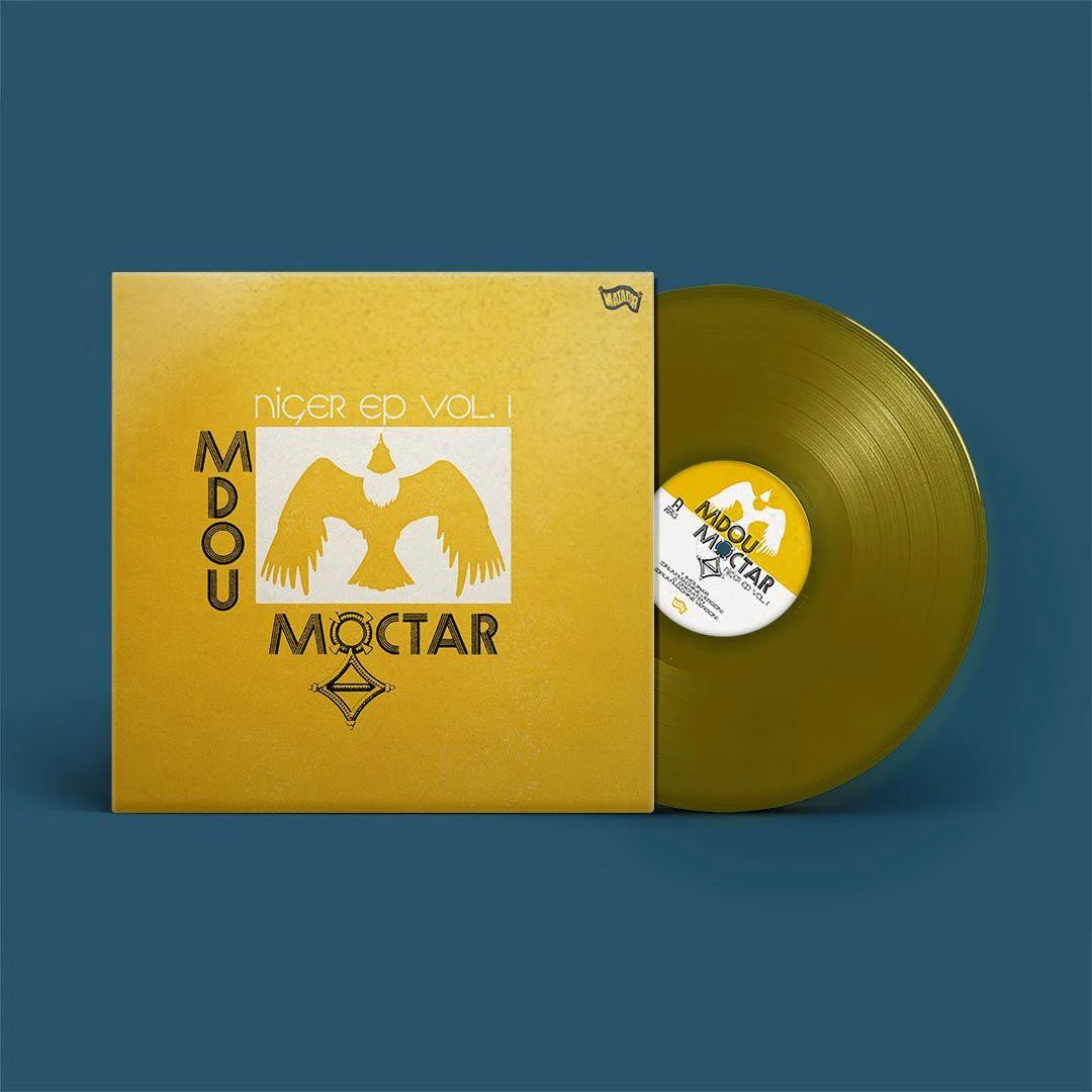 A 12-inch vinyl EP of Mdou Moctar - Niger EP Vol. 1 with a golden yellow-coloured cover and a yellow vinyl record.