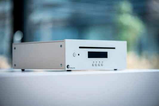 Side view of Pro-Ject CD Box DS3 CD Player, sleek silver hi-fi component with minimalist design